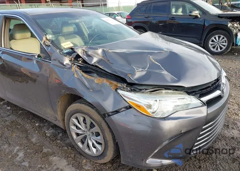 2016 Toyota Camry Le z USA, uszkodzony, nr VIN 4T4BF1FK1GR523053